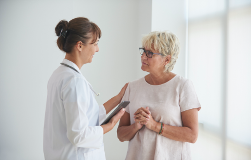 Adults being examined by physician
