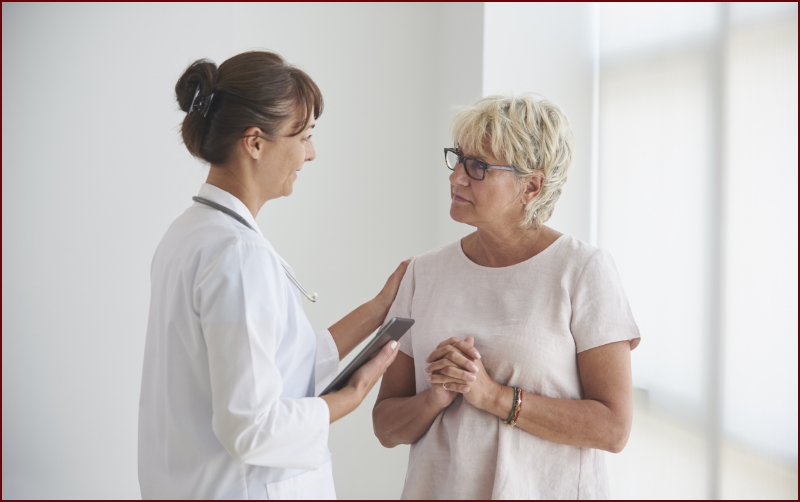 Adults  being examined by physician